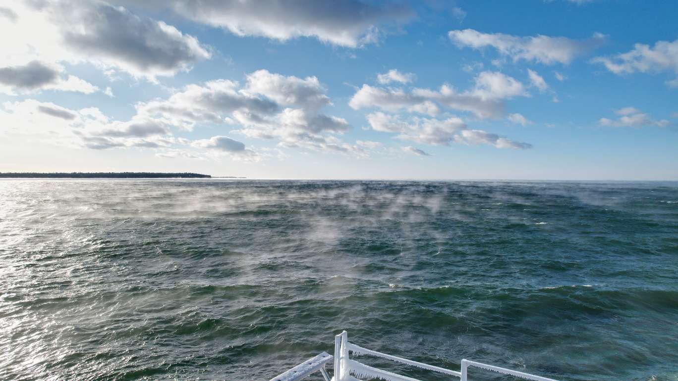 Aerial drone shot of steamy water.